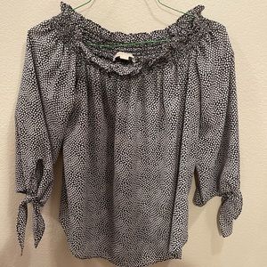 Michael Kors woman’s blouse size medium.